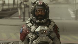 Starfield factions - Barrett in his space suit and helmet outside a ship talking to the player