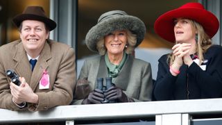 Queen Camilla with Tom Parker Bowles and Laura Lopes watch the racing