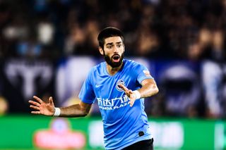 Yannick Carrasco gestures during a match for Dalian Professional against Beijing Guoan in August 2019.