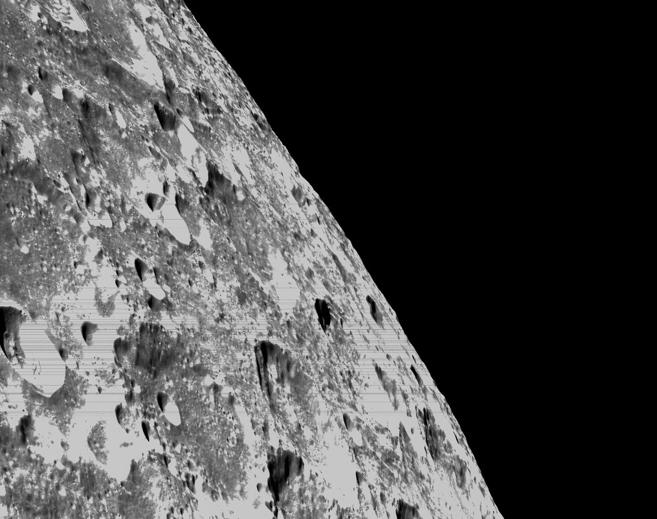 Close-up view of the lunar surface captured by the Orion spacecraft's onboard optical navigation camera during the mission's closest approach to the lunar surface on Nov. 21, 2022.