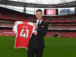 Declan Rice poses with his Arsenal shirt (number 41) after signing for the Gunners from West Ham in the summer of 2023.