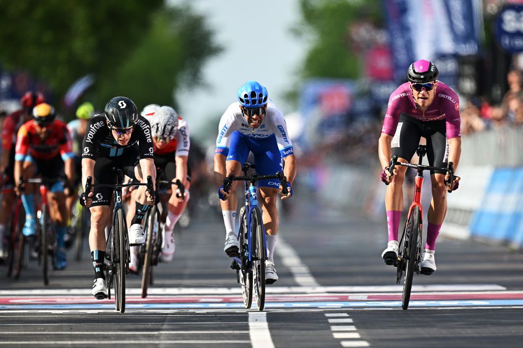 Alberto Dainese (Team DSM), Michael Matthews (Team Jayco AlUla and Jonathan Milan (Bahrain-Victorious) sprint at the finish of the Giro d&#039;Italia 2023, stage 17 