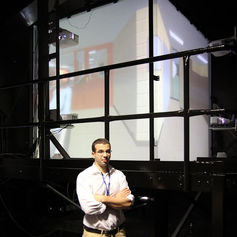 Researcher Massil Benbouriche and his virtual reality cube.