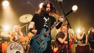 (from left) Taylor Hawkins, Dave Grohl and Nate Mendel of Foo Fighters perform onstage at the after party for the Los Angeles premiere of Studio 666 at the Fonda Theatre on February 16, 2022 in Hollywood, California