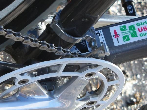AceCo's dedicated single-ring setup includes a machined aluminum outer guide plus an adjustable inner watcher with an additional stub to keep the chain from ejecting out the top. This one should ideally be placed lower and closer to the chain but the position is restricted by the vestigial mount for the front derailleur cable pulley.