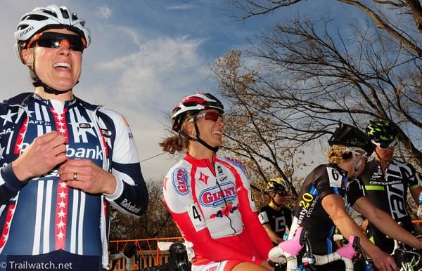 Katie Compton and Meredith Miller share a laugh at the start
