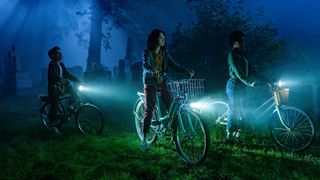 Arian S Cartaya, Clara Stack and Amanda Christine on their bikes in It: Welcome to Derry