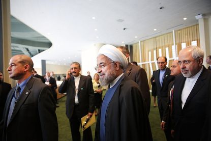 Iran's President Hassan Rouhani critiques airstrikes on ISIS as 'a form of theater'