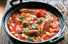 Sausage casserole recipe illustrated with an image of a sausage casserole in a crock pot