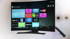 The best LG TV: Image depicts flat screen TV on white background with remote