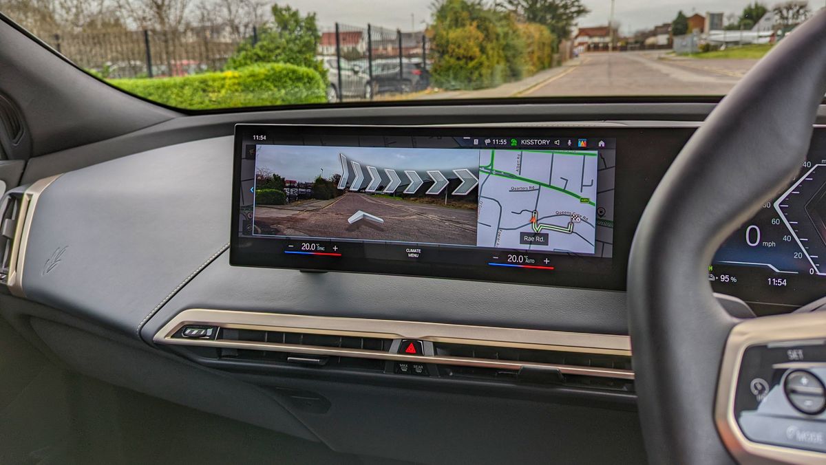 Close-up of the central display in the BMW iX with AR navigation