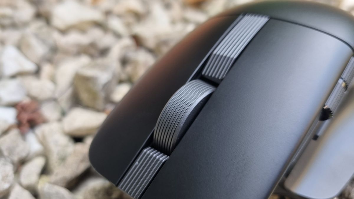 A close-up shot of the Asus ProArt Mouse MD310's scroll wheel
