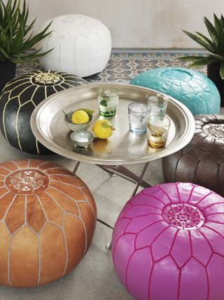 Moroccan pouffes in several colours for a boho feel in the garden