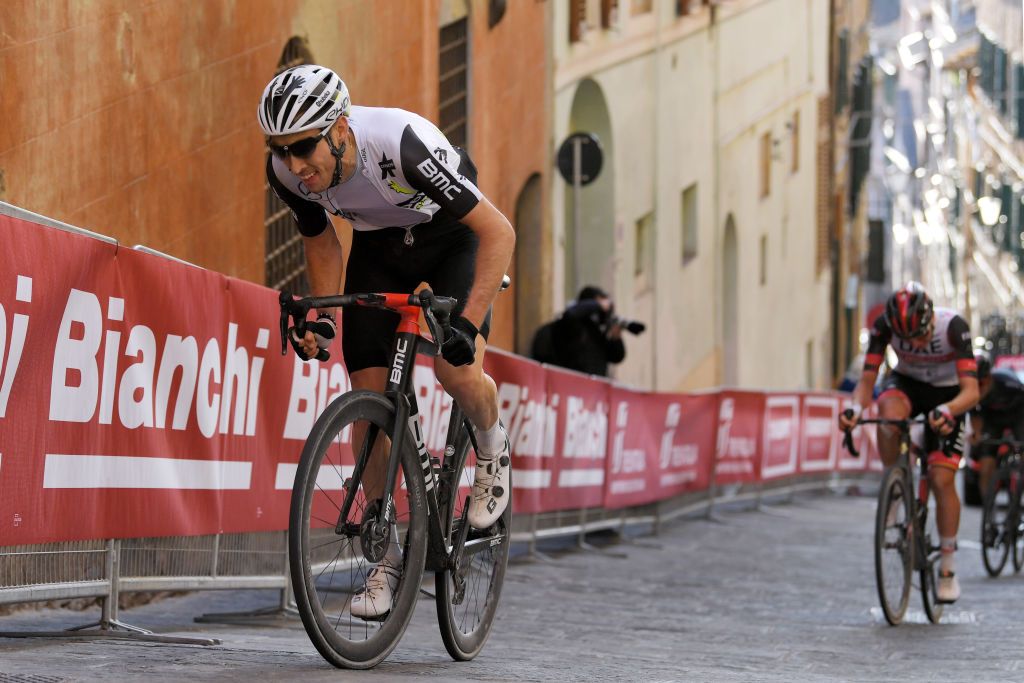SIENA ITALY MARCH 06 Michael Gogl of Austria and Team Qhubeka Assos during the Eroica 15th Strade Bianche 2021 Mens Elite a 184km race from Siena to Siena Piazza del Campo StradeBianche on March 06 2021 in Siena Italy Photo by Luc ClaessenGetty Images