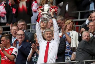 Arsene Wenger lifts the FA Cup after Arsenal's win over Chelsea in 2017