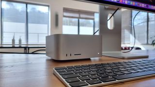 Mac Studio on wooden desk