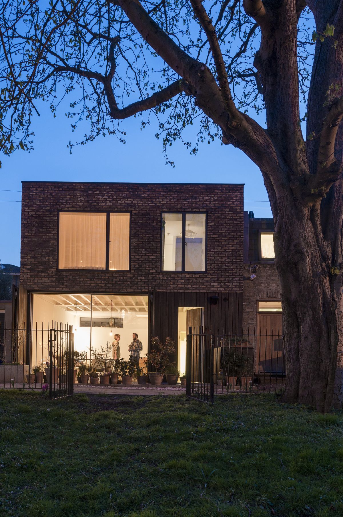 self build brick house at dusk