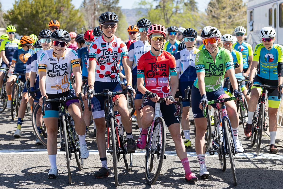 Classification jersey call-ups (l to r): Kyleigh Spearing (Cinch Rise) in white, Emily Marcolini (3T/Q+M) in the QOM jersey, Krista Dobel-Hickok (EF Education Tibco SVB) in the red leaders jersey, and Maggie Coles-Lyster in the Green sprint jersey.