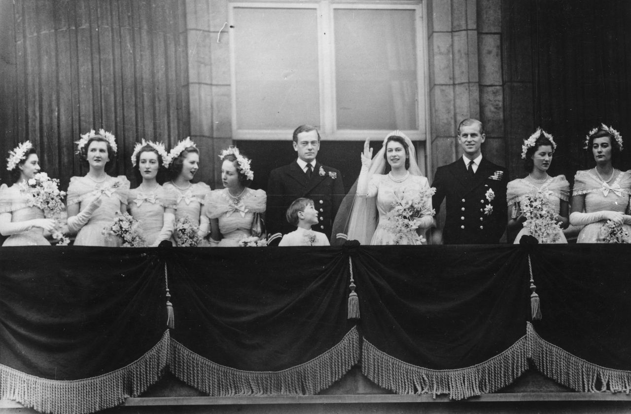 Lady Elizabeth (5th from left) on the balcony at Buckingham Palace in the dress.