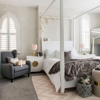 white bedroom with four poster bed