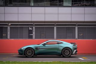 Aston Vantage F1 Edition in front of a building during the daytime
