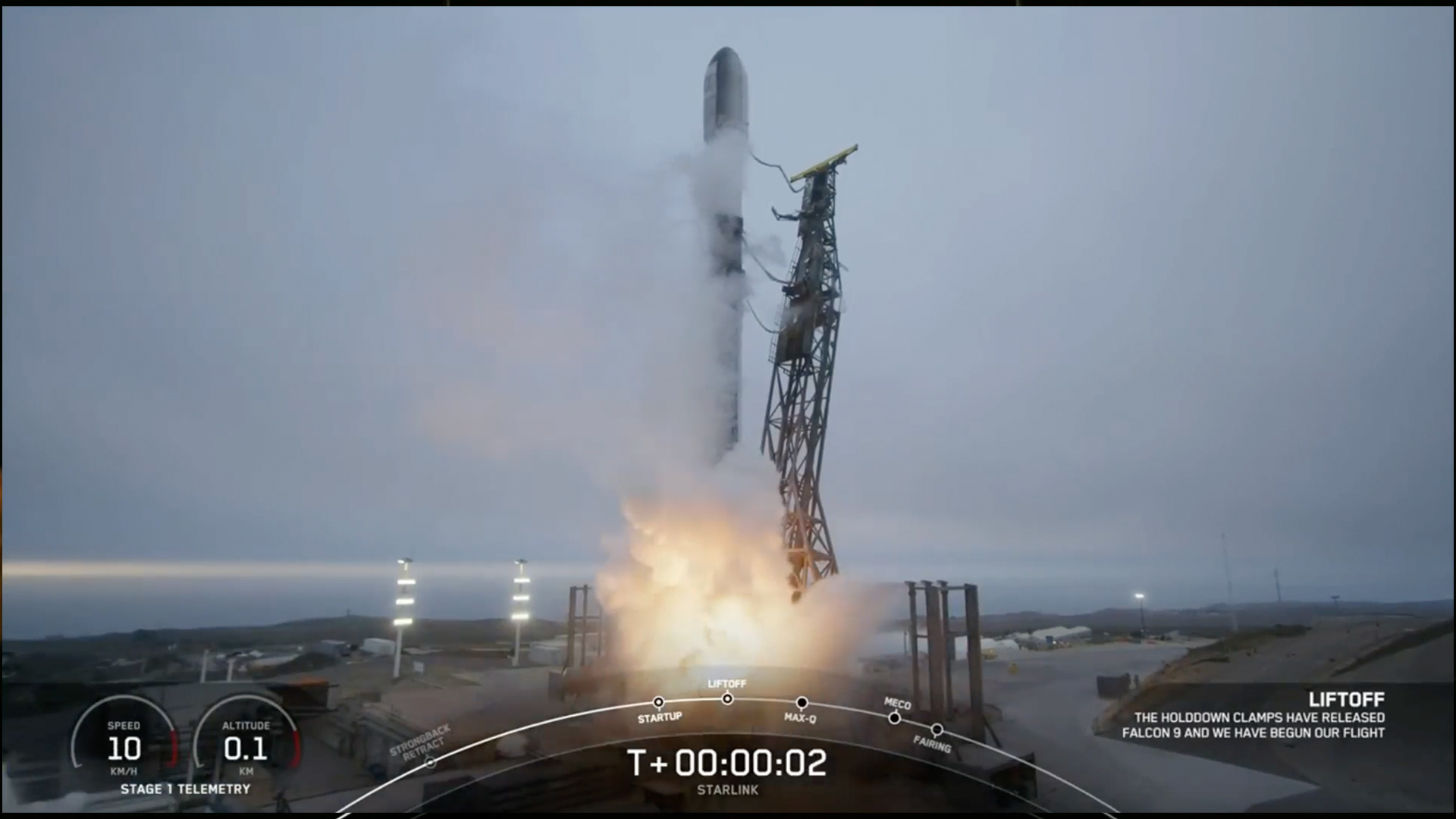 a rocket lifting off above a plume of fire. gray clouds are in the background