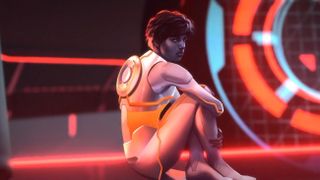 A young man sits atop a desk and looks over his shoulder in Tron: Identity.