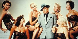 Marlon Brando and an ensemble of women in 1955 Guys and Dolls movie
