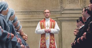 Jude Law may look like the most unlikely head of the Catholic Church, but that’s all part of the fun of this glossy but quirky saga