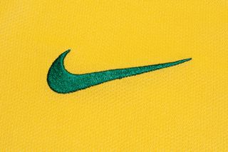 Nike's Swoosh logo on a Brazil home shirt