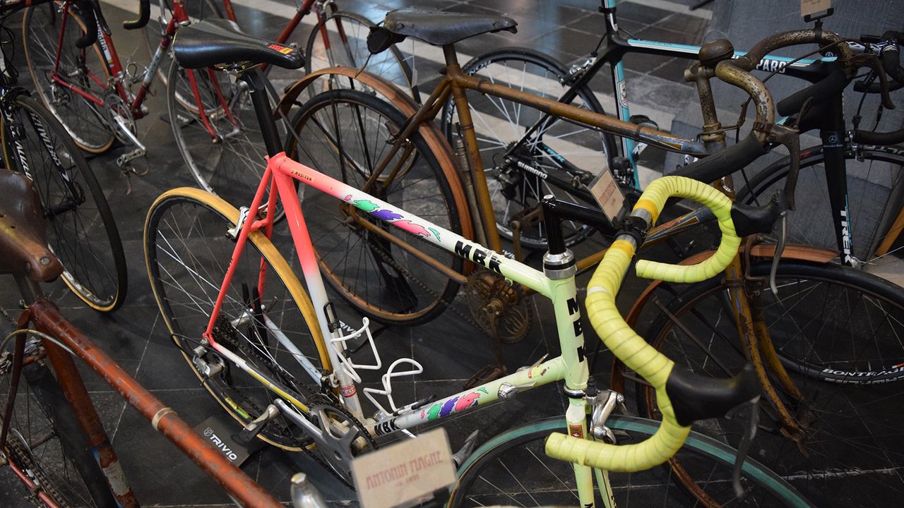 Johan Museeuw's 1990 MBK, complete with lugs, down tube shifters and a period fluoro paint scheme