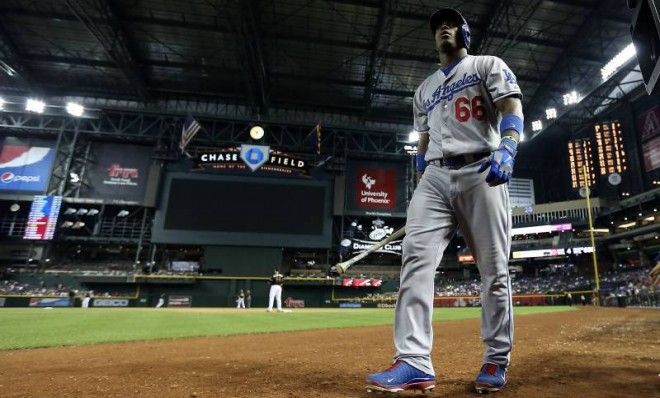 Dodger phenom Yasiel Puig looms large over the first half of the 2013 season.