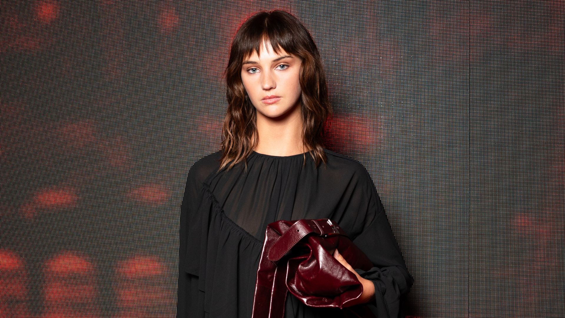 Mia Regan wears H&M boots at the H&M London Fashion Week runway show.
