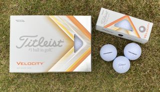 Titleist Velocity 2022 Golf Ball and its yellow and silver packaging