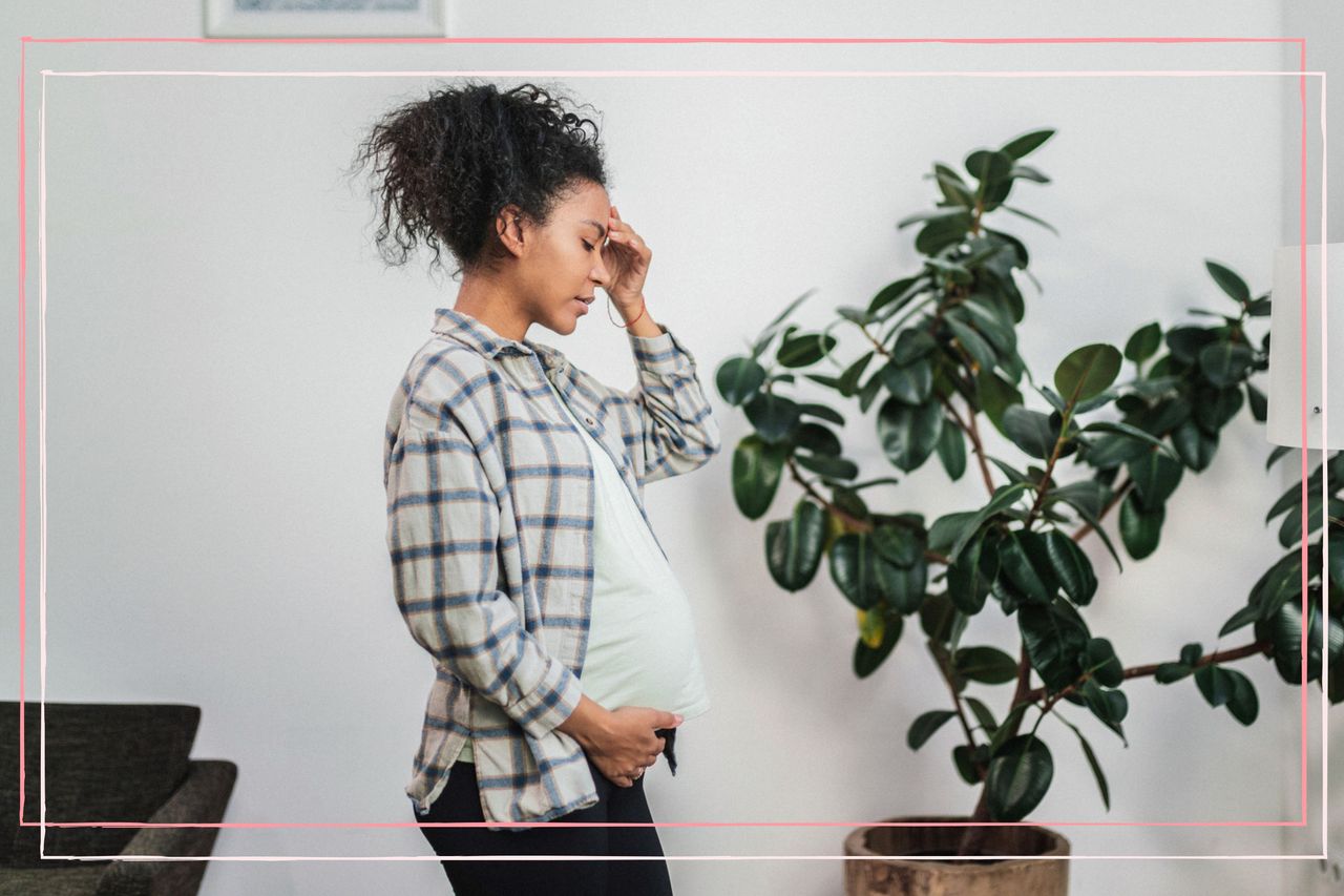 A woman exhibiting the signs and symptoms of anaemia in pregnancy by looking tired and dizzy