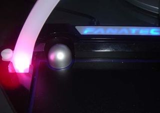 The Aura game pad has LED lights located at each end of the arch.