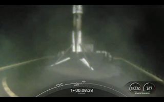 The first stage of a SpaceX Falcon 9 rocket sits on the company's "Just Read the Instructions" drone ship shortly after landing successfully on March 11, 2021.