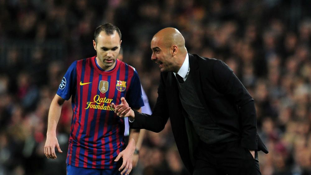 Andres Iniesta and Pep Guardiola during their time together at Barcelona