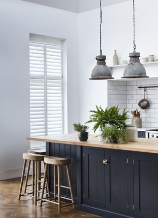 kitchen Window shutters at French doors in a kitchen by Shutterly Fabulous