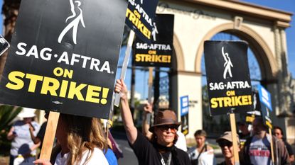 SAG-AFTRA members picket outside Paramount Studios in Los Angeles