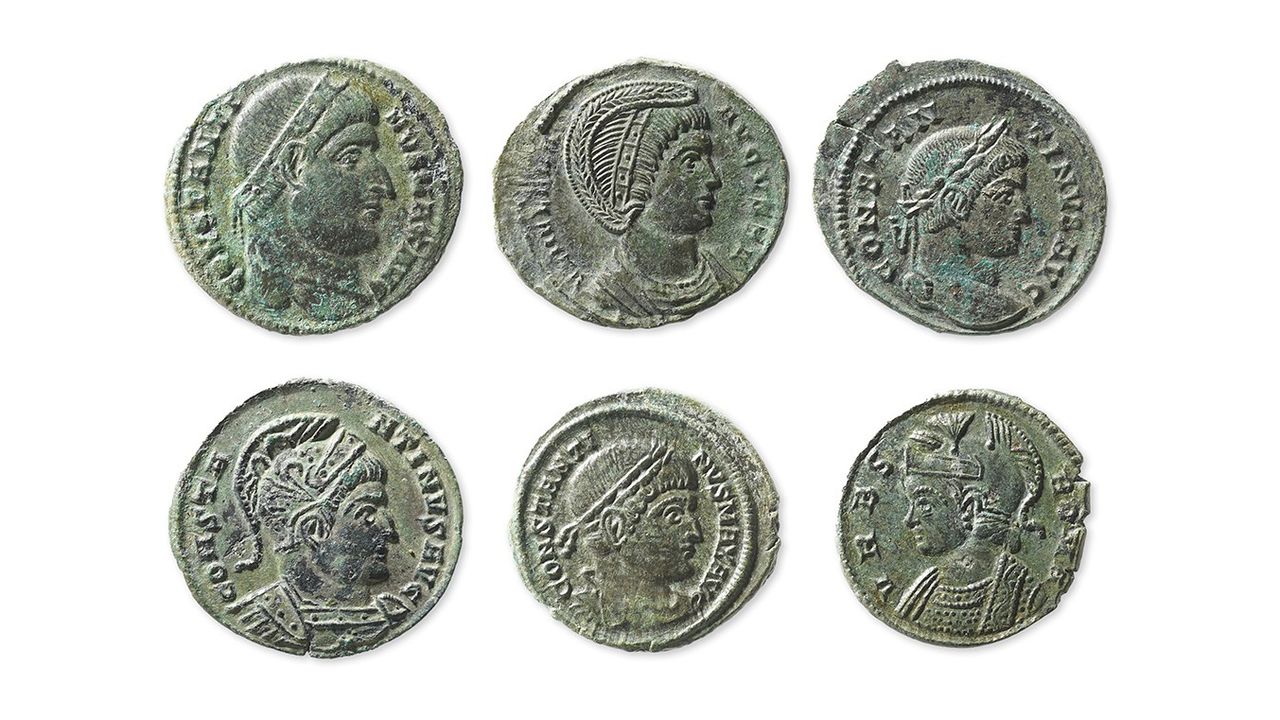 The coins found in the pot have inscriptions and designs on each side,
