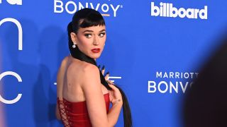 Katy Perry in red dress at the Billboard Women in Music Awards.