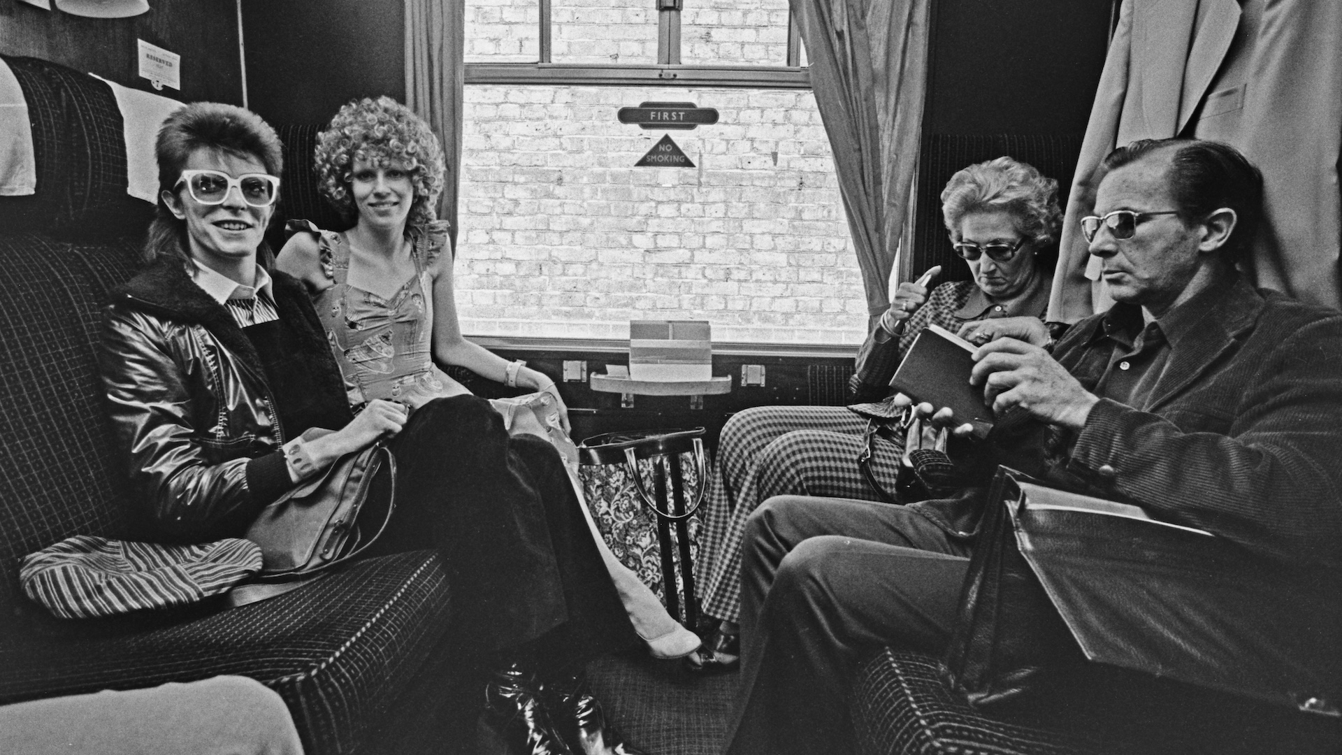 David Bowie, and his wife Angie, travelling to France from London's Victoria Station on July 9, 1973.