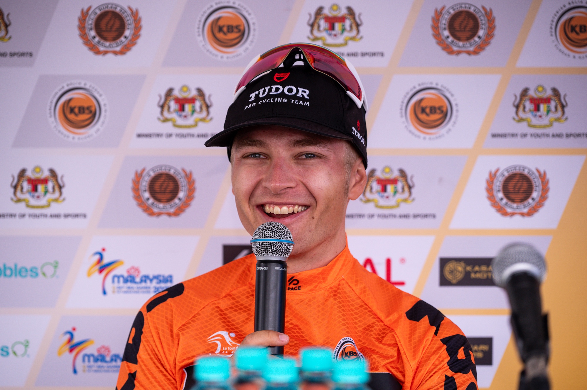 Lennart Jasch (Tudor Pro Cycling) in the orange leaders jersey at Le Tour de Langkawi after stage 5