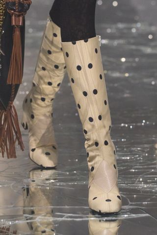 polka dot boots on the runway