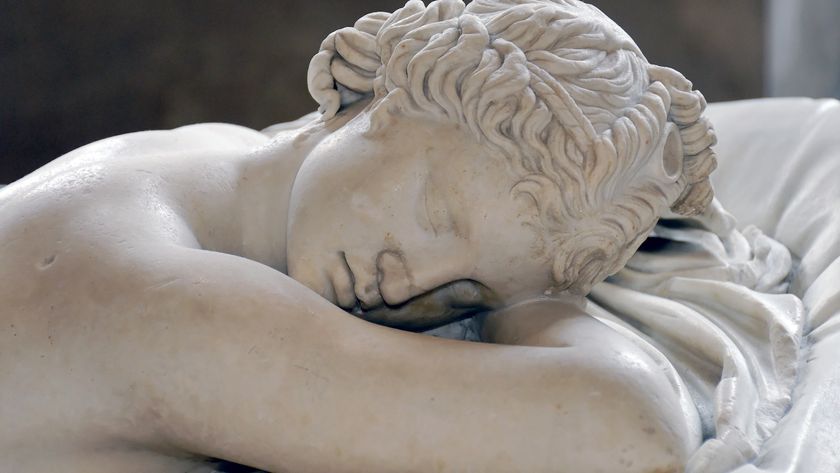 a photo of a Roman statue of a woman sleeping