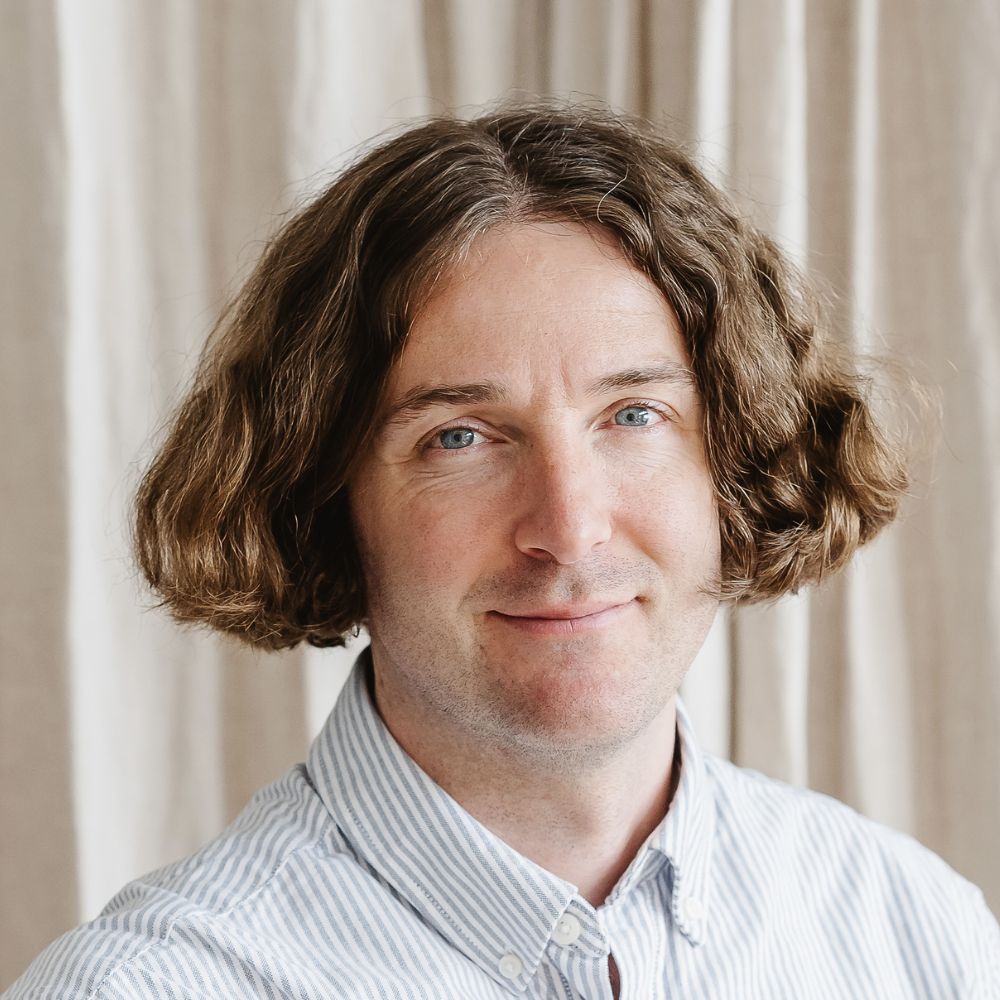 A headshot of Max Wilson