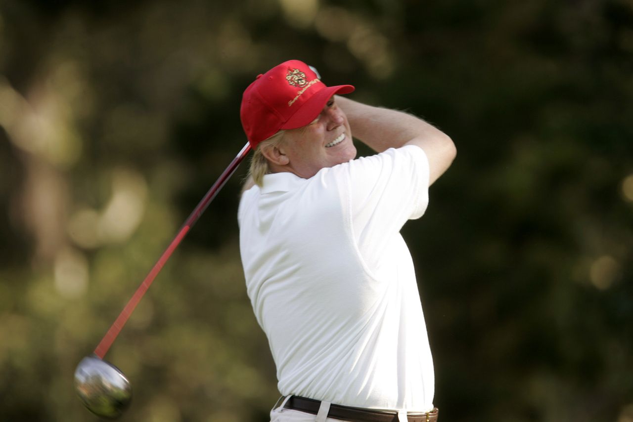 Donald Trump playing golf