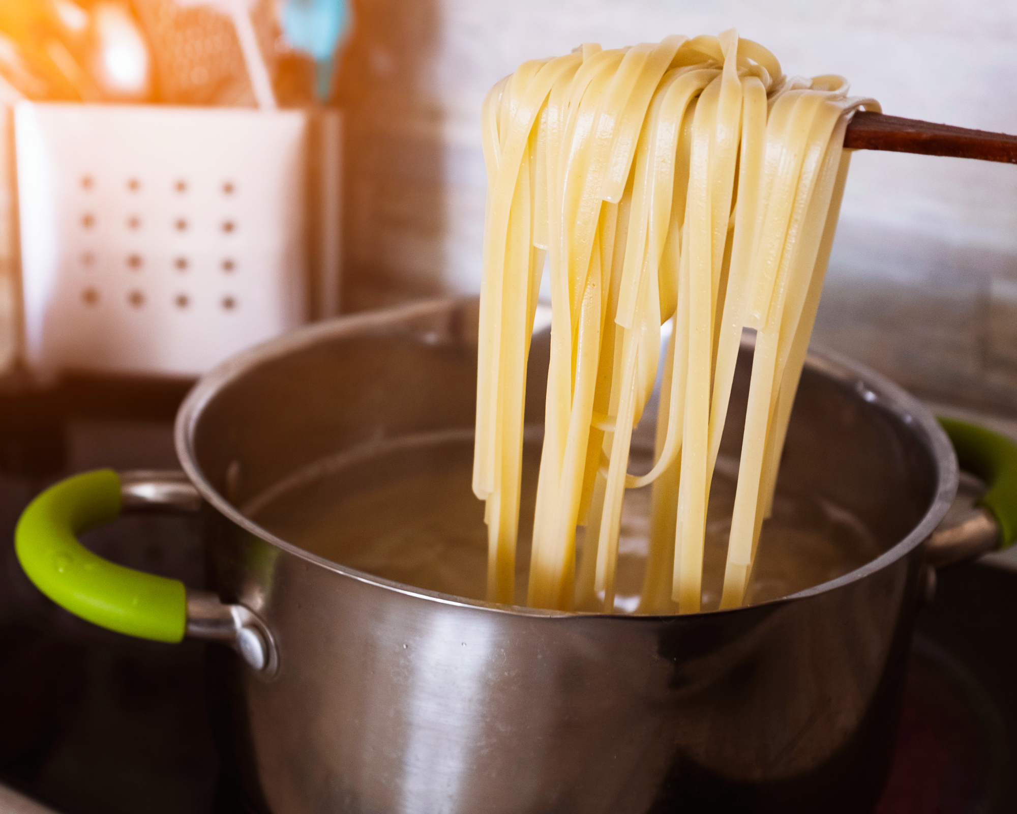 Pasta noodles boiling in water