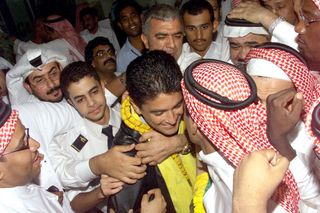 Bebeto greeted like a hero on his arrival in Saudi Arabia after signing with Al-Ittihad in September 2002.